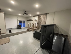 Mudroom entry to lower level family Rm, bar, 5th bedroom and 4th bath