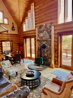 Open floor plan main floor with wood stove