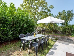 Plant, Property, Plant Community, Table, Nature, Sky, Shade, Outdoor Furniture, Outdoor Table, Natural Landscape