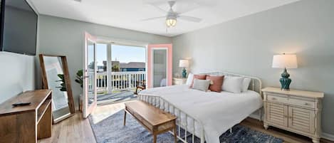 The top-floor master suite has a private patio with ocean views