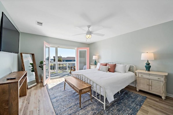 The top-floor master suite has a private patio with ocean views