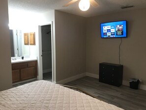 40 inch Roku Smart TV in Master Bedroom.