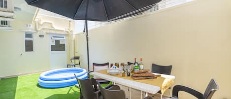 Spacious Outside Terrace with garden furniture and splash pool for the kids