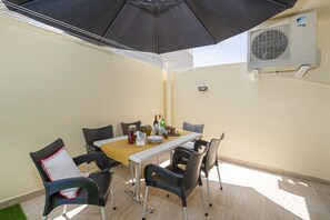 Spacious Outside Terrace with garden furniture 