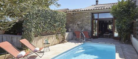 Enjoy the heated pool in the  secluded garden.  Towels and robes provided.