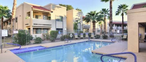 Overlooking the community pool and spa