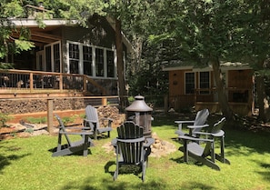 Cottage, firepit, and Guest Cabin..