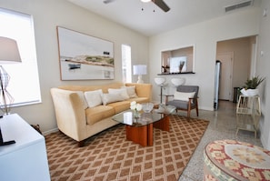 View of the living room leading to the kitchen