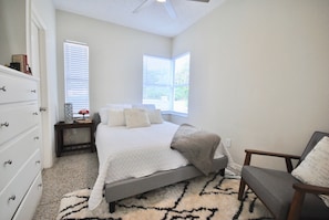 Master Bedroom with a queen bed and view of the yard