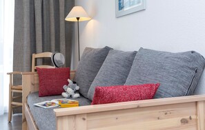 Sink into the cozy sofa after a day exploring the area.