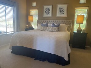 Primary king bedroom with walk-in closet and en-suite bath