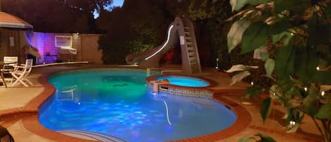 Jacuzzi, Slide, Pool, BBQ, Firepit all for your private use. 