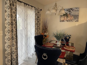 Dining table 4 chairs. Extra chairs are available!