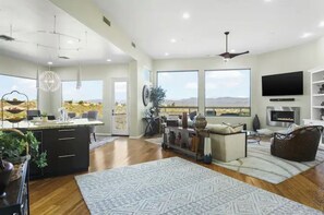 Large living area with surrounding views