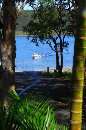 View of lake from upstairs deck. Go boating or kayaking on the lake.