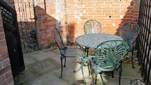 Seating at rear of Loom Cottage- from stable door in kitchen/diner.