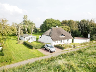 Romantic thatched roof house by the sea, ideal for 2 families or a large family
