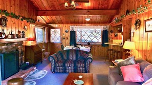 Charming cabin featuring knotty pine accents and vintage mounta - Charming cabin featuring knotty pine accents and vintage mountain decor.