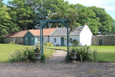 2 self-catering cottages booked as one with secure garden area.