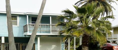 House front with 3 - 4 vehicle driveway.