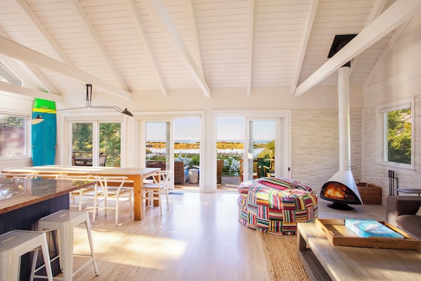 light filled great room with amazing views over both the pond and the bay. 