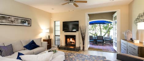 The lounge with double doors to the back patio overlooking the golf course