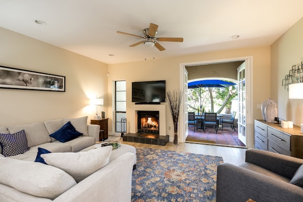 The lounge with double doors to the back patio overlooking the golf course