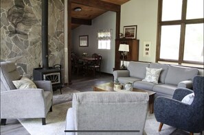 Living Room with wood burning fireplace.