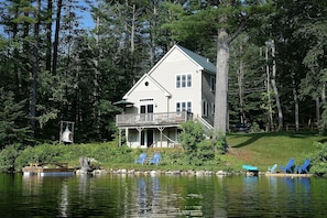 Along the shoreline we have a small dock, Adirondack chairs and fire pit
