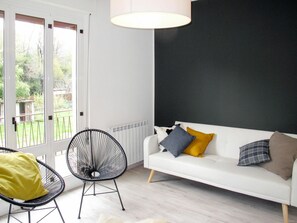 Furniture, Room, White, Yellow, Interior Design, Property, Living Room, Floor, Lighting, Ceiling