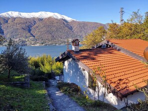 Plant, Sky, Water, Building, Window, Mountain, Leaf, Natural Landscape, House, Tree