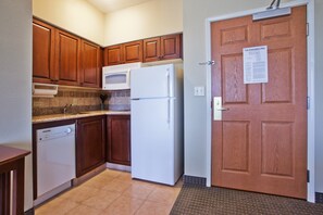 Prepare a meal in the equipped kitchen.