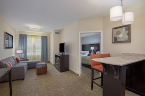 Sink into the cozy sofa after a day exploring the area.