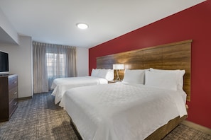 Relax on the comfy bed after a day outside.