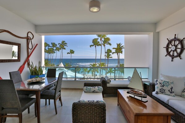 Balcony view to beach and pool.