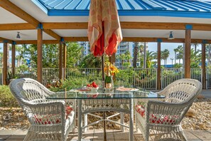 Beautiful White Wicker Patio Table, seating for 4 with additional loveseat for 2