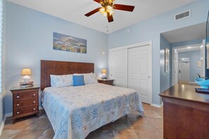 Master Suite:  King Bed, 60" Smart tv, large closet & Bahama Shutters