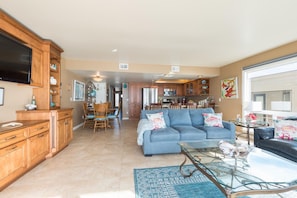 Living room with view of dining area.