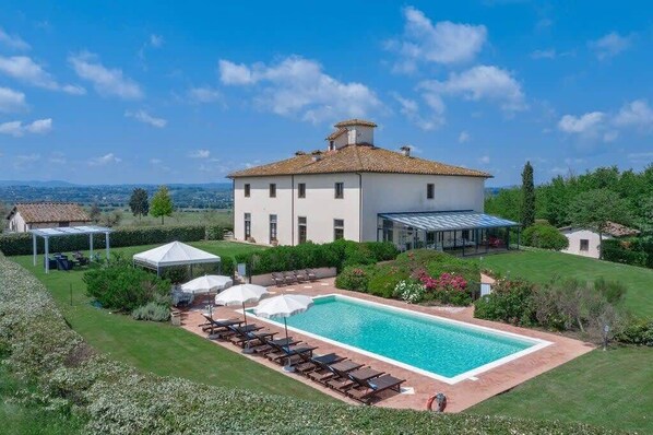 View of the villa and pool