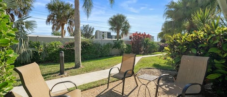 Enjoy Florida natural scenery in your very own backyard! - Lounge, catch up on your latest read, or nap peacefully on the chaise loungers. The Gulf wind rustles the palms and the balmy breeze will wrap around you at any time of the day.