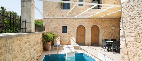 Stone facade from patio-pool area.