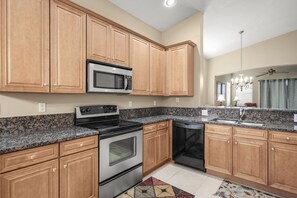 Fully Equipped Kitchen with Stainless Steel Appliances