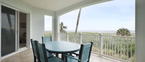 Enchanting Balcony View - Listen to the palms rustle and the gentle waves crash against the shore beyond as you sit on our balcony and soak it all in.