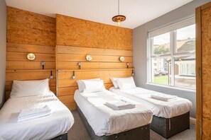 Triple 3 single zip lock beds, 2 of which can be zipped together to make 1 king size bed (bedding available for king size bed)
