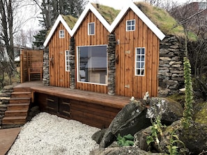 The outdoor sauna is like old Icelandic turf house ,,, like Iceland around 1700