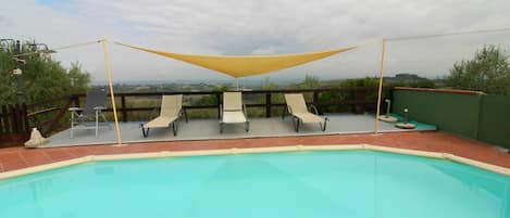 Sky, Water, Cloud, Property, Swimming Pool, Azure, Shade, Plant, Outdoor Furniture, Composite Material