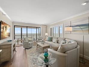 Living Area - From the large, elegant windows to the attractive furniture, you and your guests will love spending time together in this serene space.