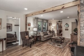 A Perfect Mix of Rustic Comfort - Wood floors, wood stove and southwestern accents add authentic charm to this cozy space.