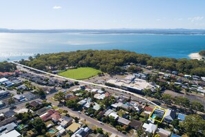 Walk 700 metres to Nelson Bay Beach & Fly Point.