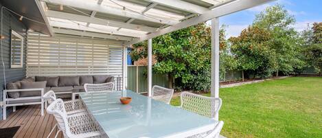 Fantastic deck with outdoor lounge and dining overlooking fully fenced pet friendly garden